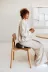 PPV-02.36CGR_HiRes_PNG_RGB_VLUV_PIL+PED_STOV_Greige_Mood_Sitting on chair_01