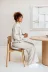 PPV-02.36TO_HiRes_PNG_RGB_VLUV_PIL+PED_SOVA_Toffee_Mood_Sitting on chair_01