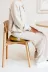 PPV-02.36MU_HiRes_PNG_RGB_VLUV_PIL+PED_LEIV_Mustard_Mood_Sitting on chair_02